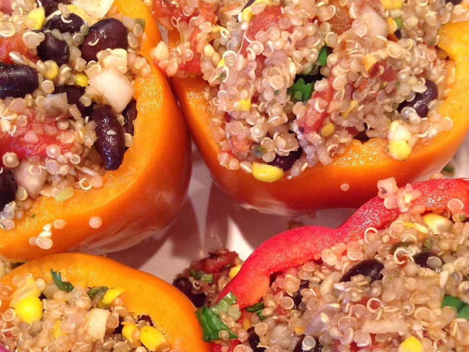 Close up view of Quinoa Stuffed bell Peppers on a white plate