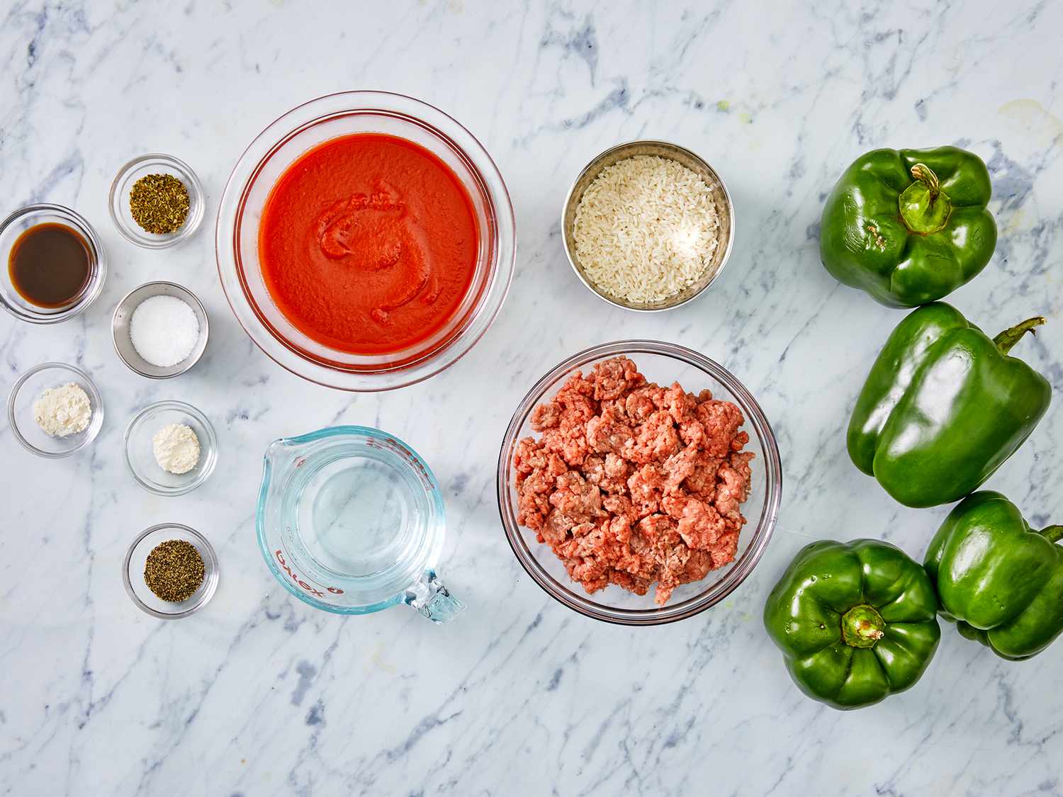 A top down view of all ingredients measured and prepped for stuffed peppers.