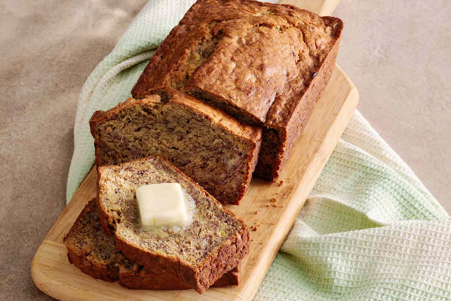 Loaf of Banana Banana Bread with butter