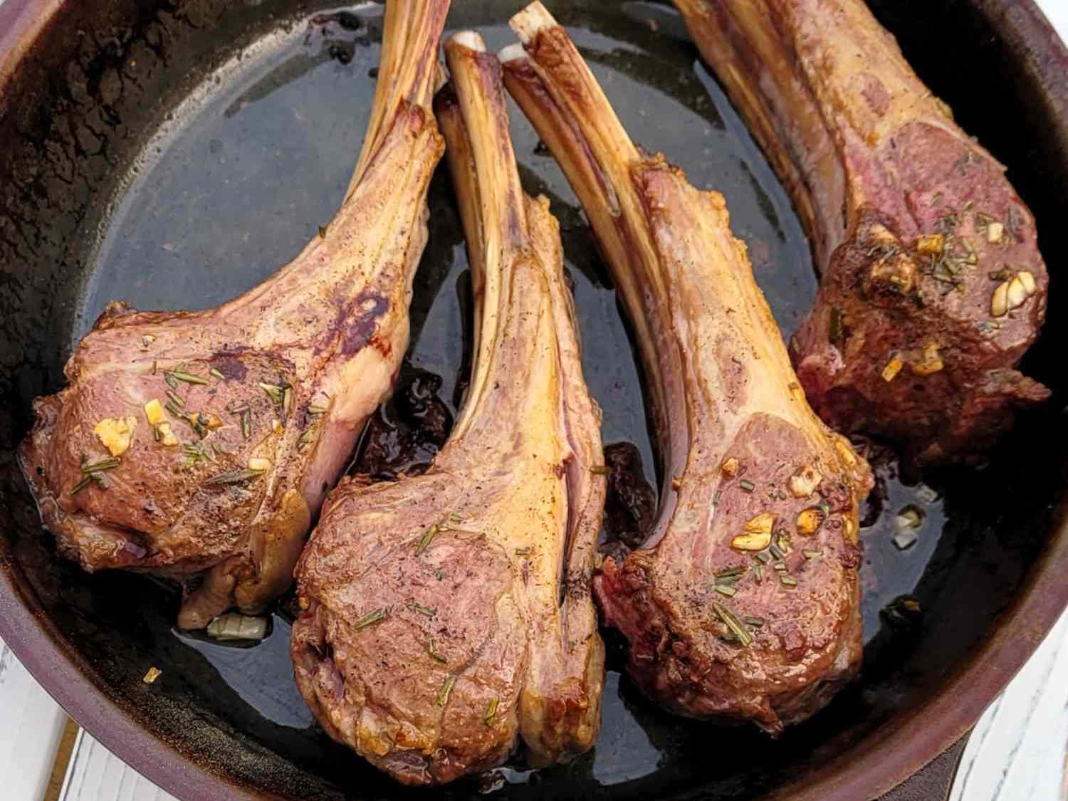 Close up view of Oven-Roasted Lamb Chops in a pan