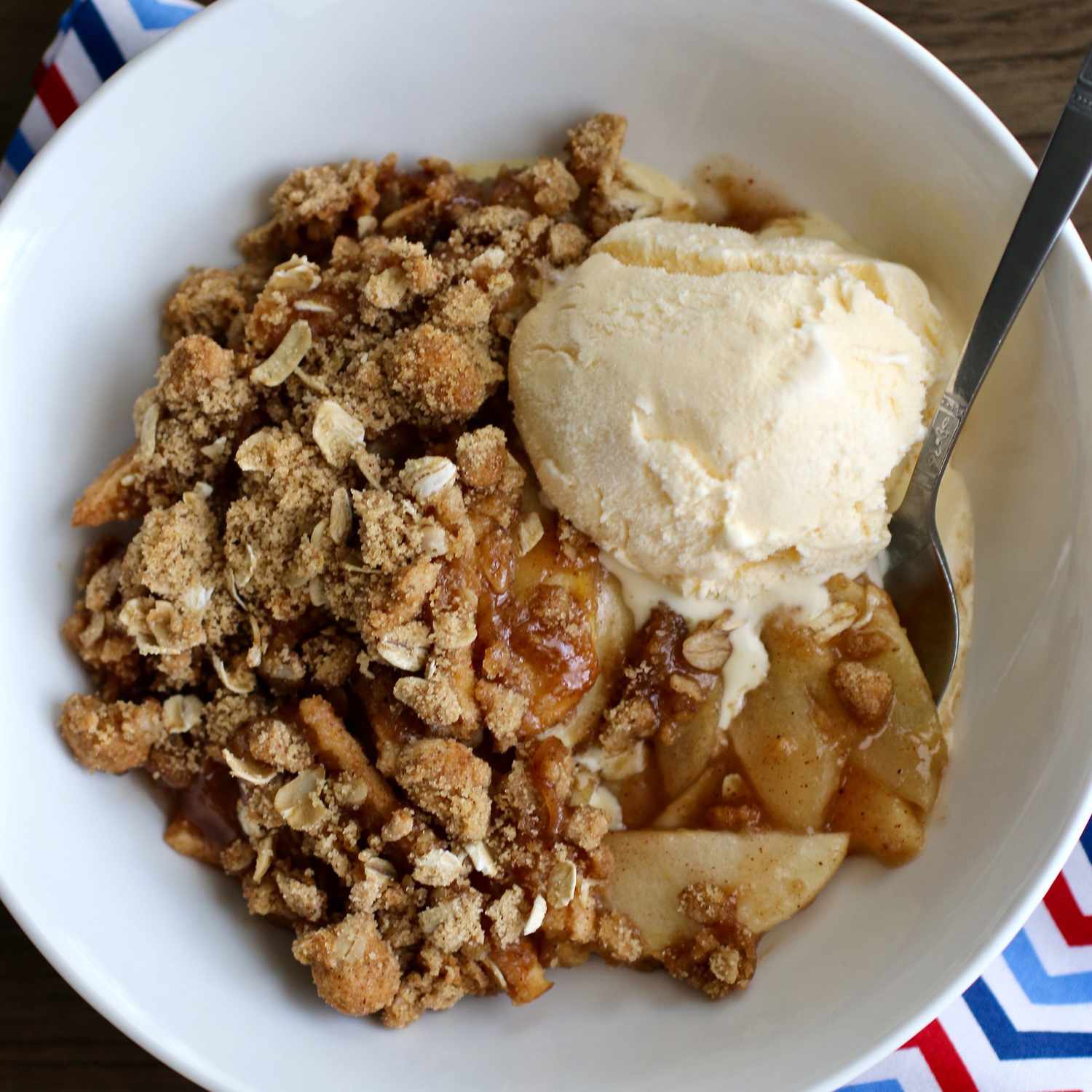 Overhead view of homemade Apple Crisp II in a white bowl