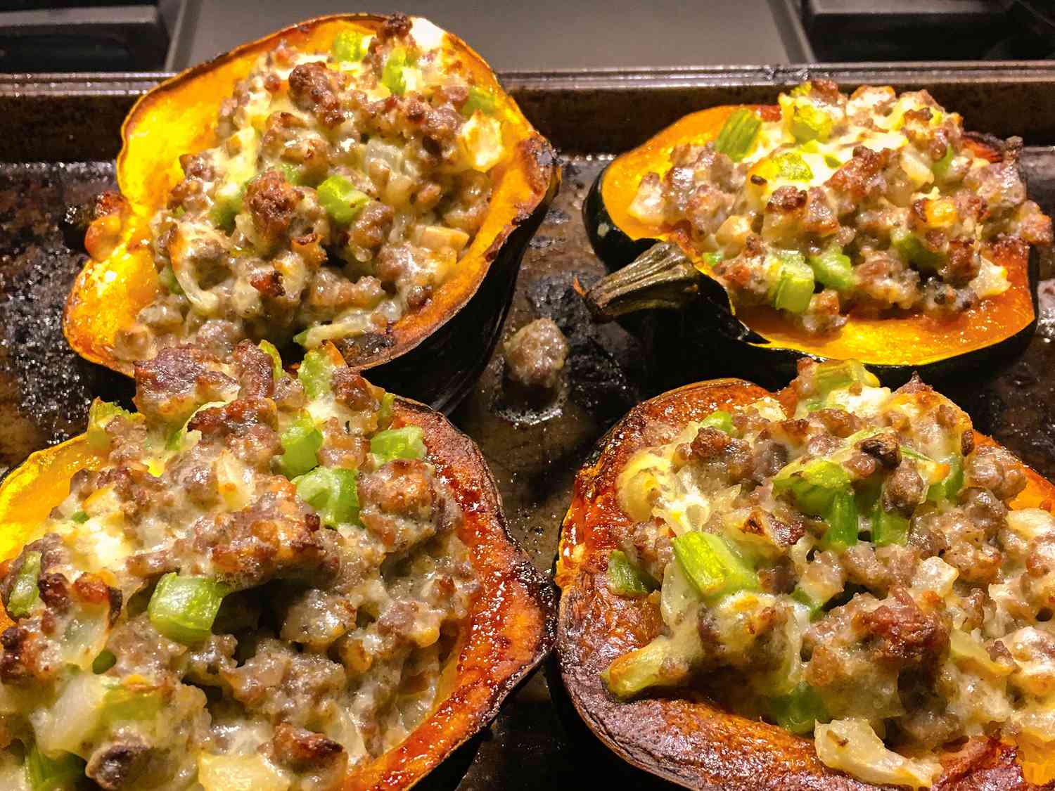 Close up view of Sausage-stuffed Squash in a baking pan