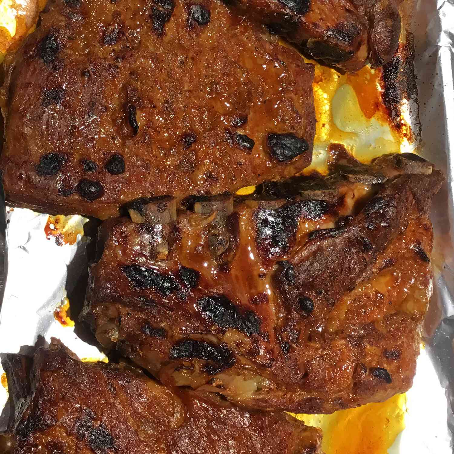 Overhead view of Tender Pork Spare Ribs in a baking dish