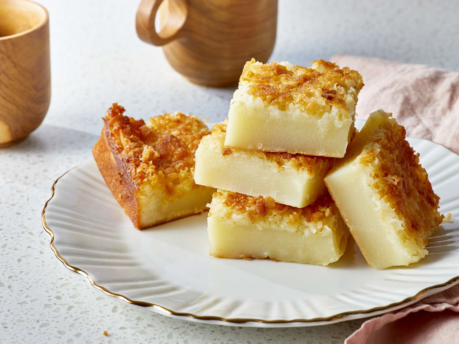 Close up on a stack of ono butter mochi squares