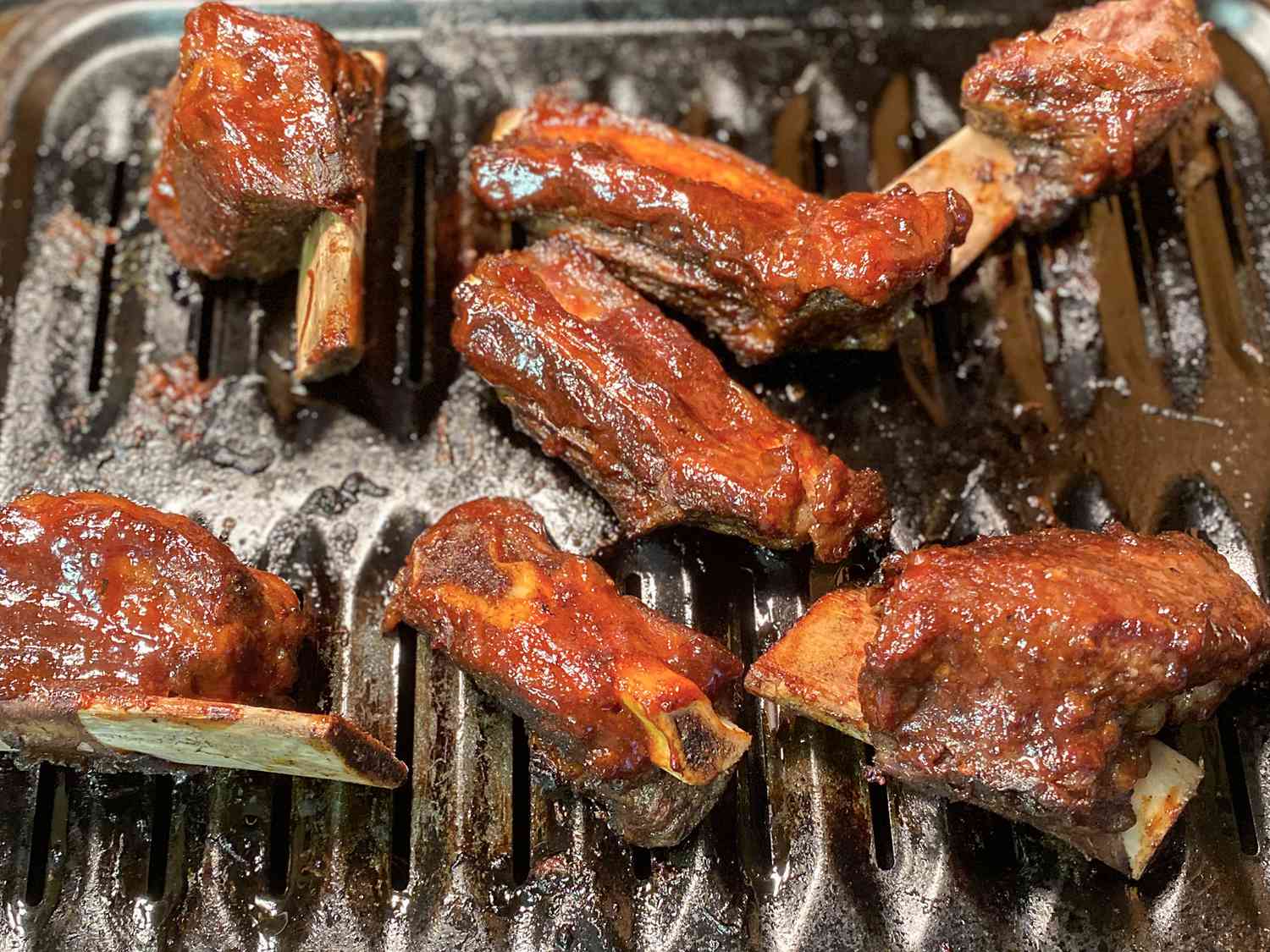 Close up view of Broiled Short Ribs on a broiler