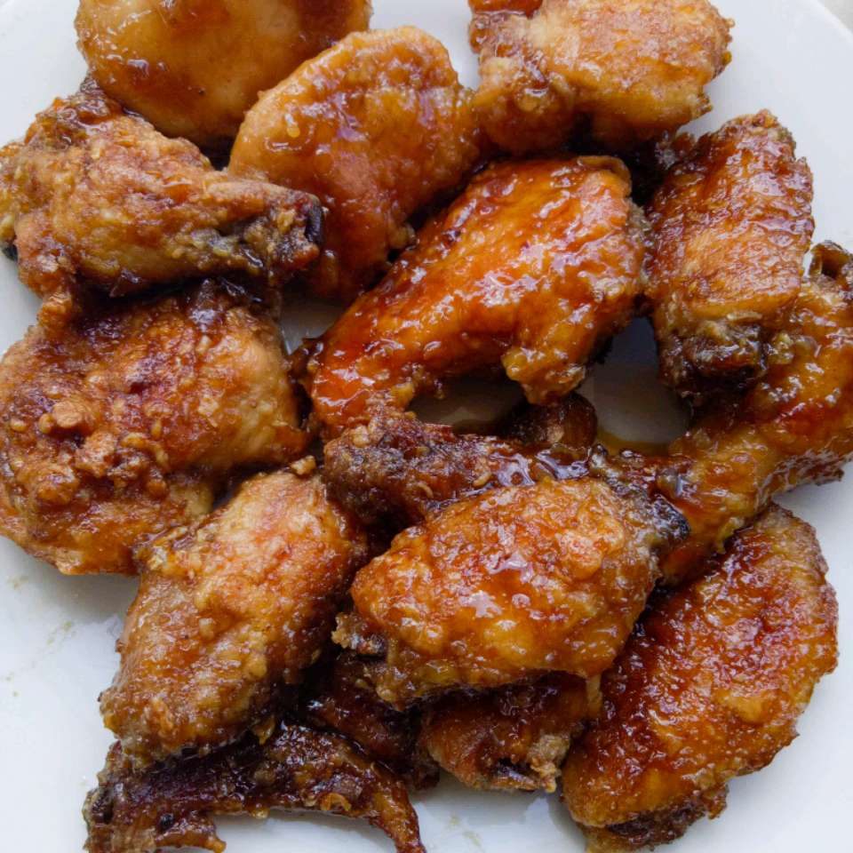 Close up view of Japanese Chicken Wings on a white plate