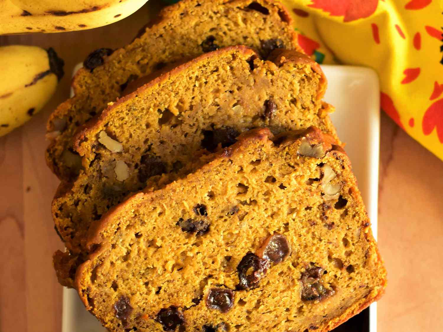 Close up view of sliced Banana Pumpkin Bread on a platter