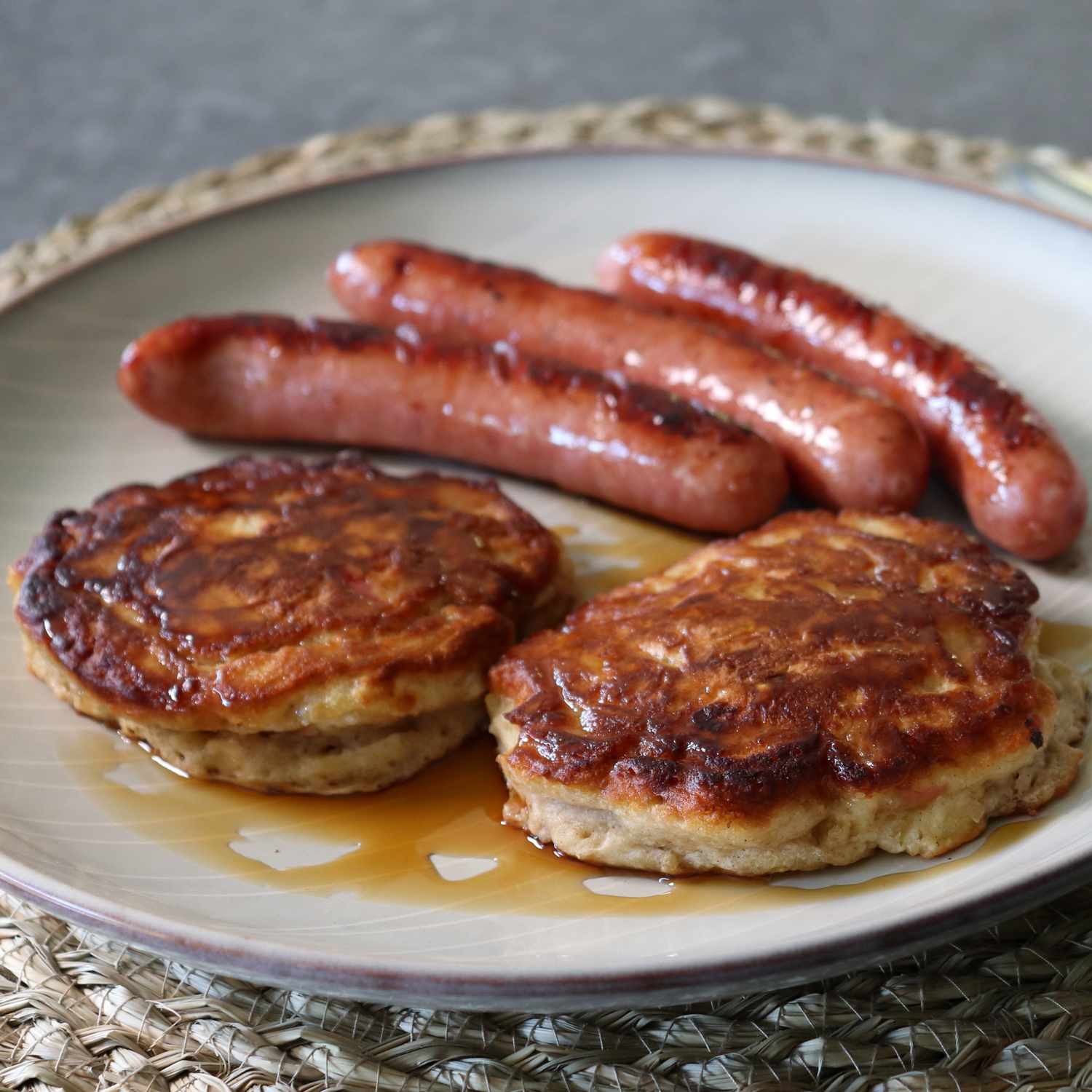 Apple Fritter Pancakes and sausages on plate