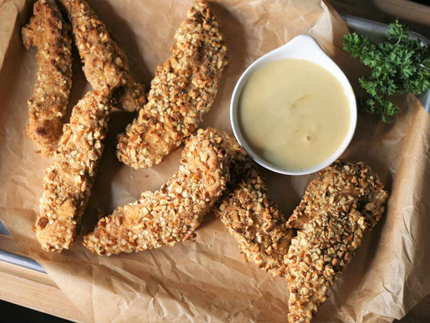 Pretzel-Crusted Chicken Tenders with honey mustard dipping sauce